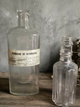 Load image into Gallery viewer, Antique Bottles Peroxide of Hydrogen &amp; Pleated Long Neck.
