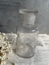 Load image into Gallery viewer, Antique Apothecary Bottle With Lid - FR Bayer &amp; Co.