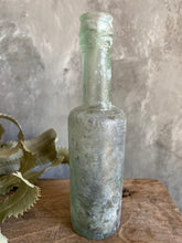 Load image into Gallery viewer, Antique Aqua Sauce Bottle - Circa 1900.