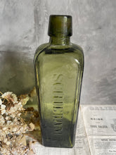 Load image into Gallery viewer, Vintage Olive Green Schnapps Bottle.