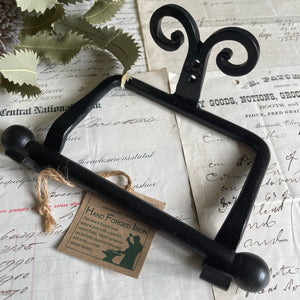 Hand Forged Black Iron Scroll Toilet Tissue Holder.