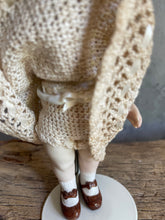Load image into Gallery viewer, Bisque Porcelain Artisan Child’s Doll With Hand Crochet Clothing.