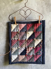 Load image into Gallery viewer, Handmade Mini Quilt On Wire Hanger.
