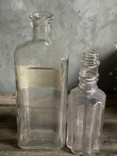 Load image into Gallery viewer, Antique Bottles Peroxide of Hydrogen &amp; Pleated Long Neck.